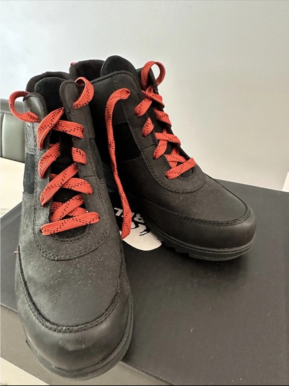 Sorel Evie Black Ankle Boots with Red Lace Accents